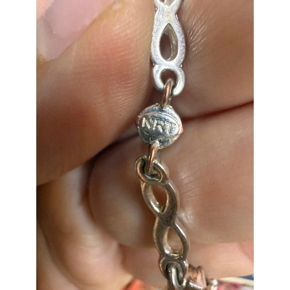 NRT Silver Tone Infinity Link Bracelet Light Blue Crystal Bezel Set 7.25 Inch